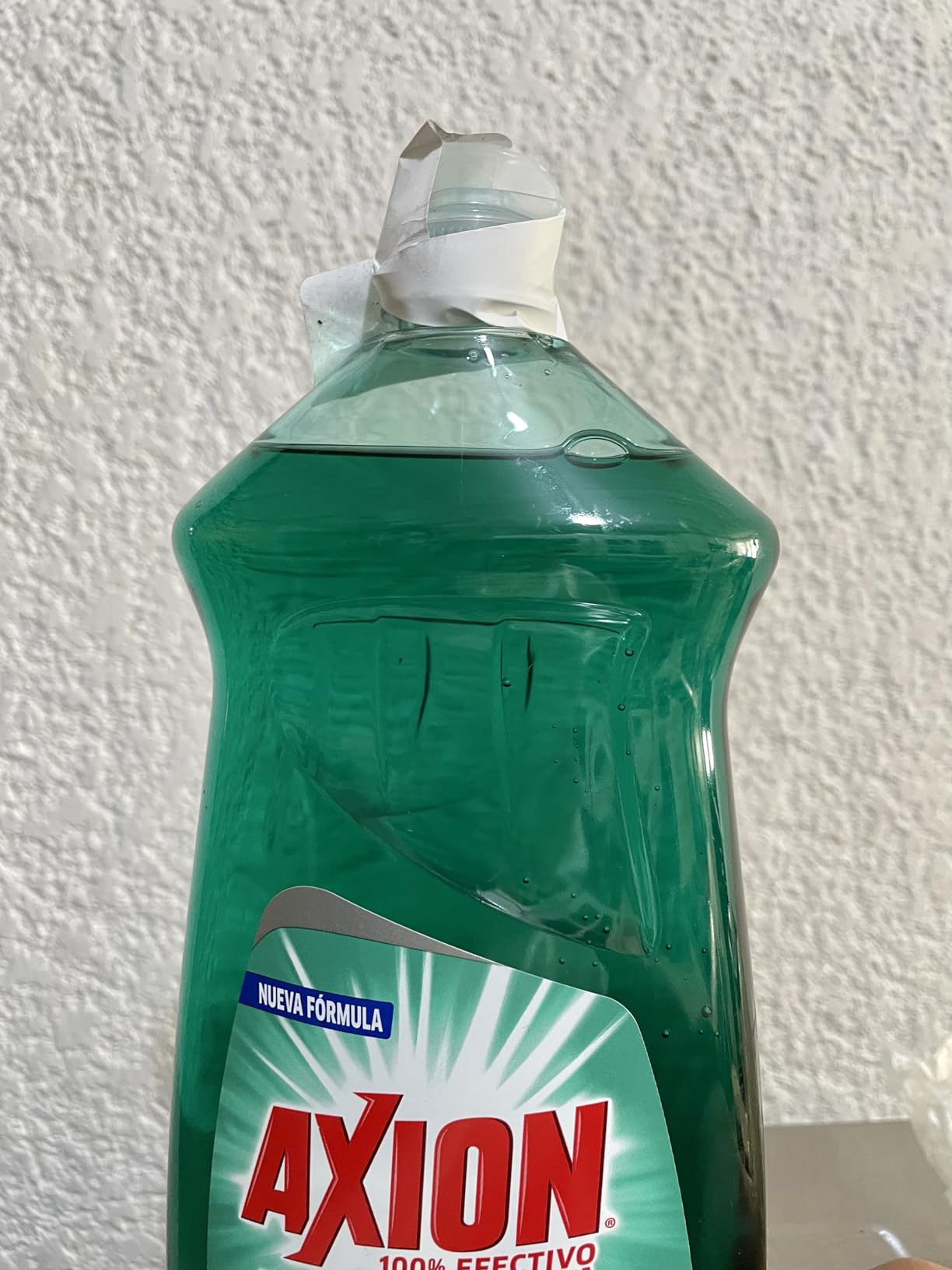 Axion Lavatrastes Líquido Poderoso en Plásticos 1.1 L.