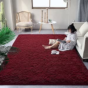 Alfombra esponjosa de color rojo borgoña para recámara